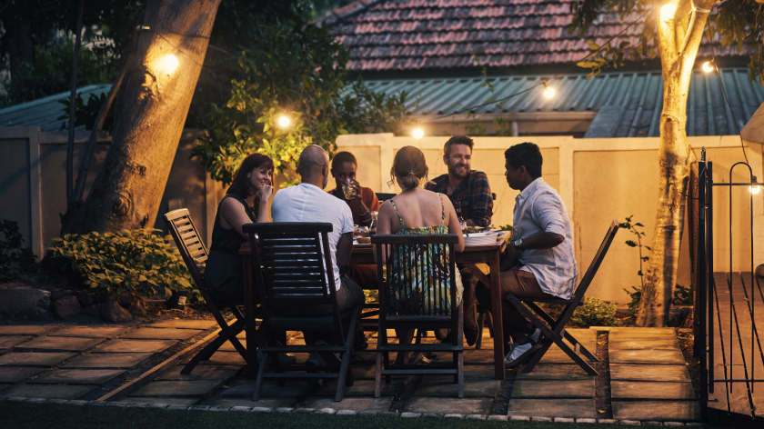 Backyard dining al fresco with friends - Vitality