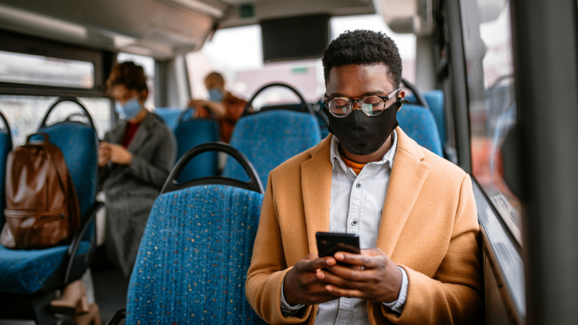 Man commuting to work in face mask during covid - Vitality