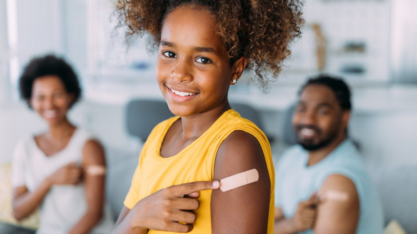 Girl with bandaid after vaccination - Vitality