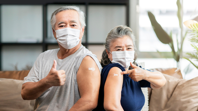 Seniors with face masks for vaccinations - Vitality