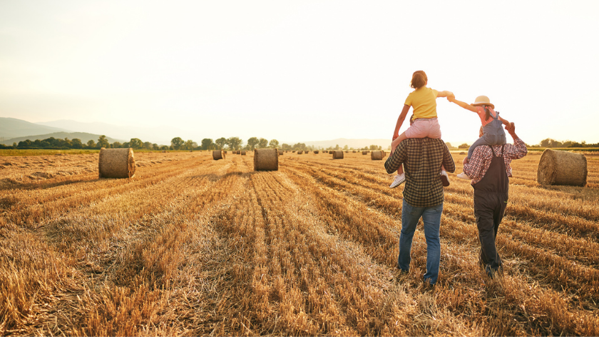 Family walking in field for National Rural Health Day - Vitality