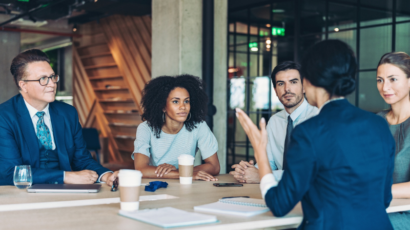 Employees having meeting on site after return to office - Vitality