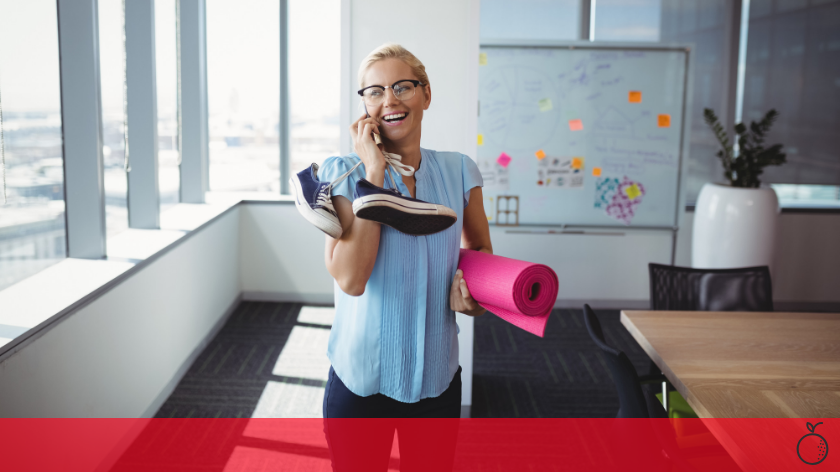 Woman with yoga mat on phone to communicate health promotion effectively - Vitality