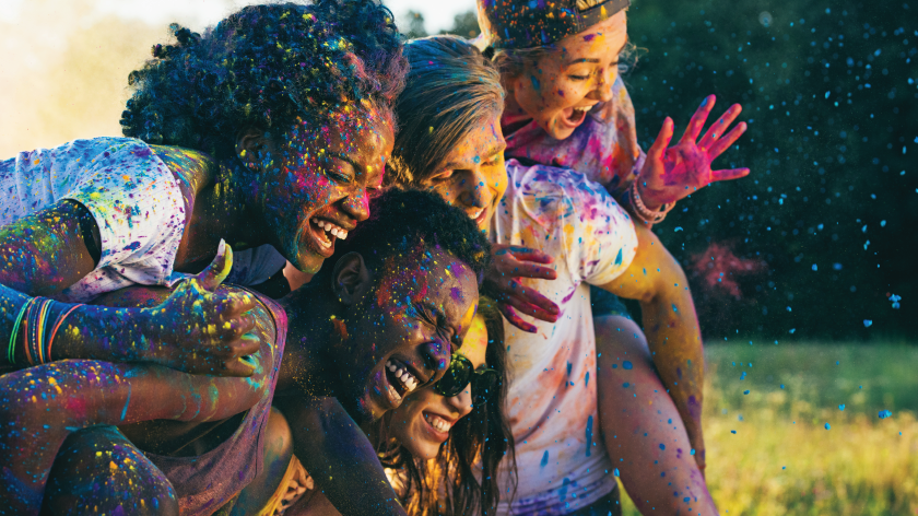 Group of girls having fun with splatter paint - Vitality