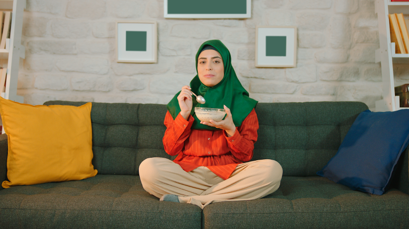 Woman eating to improve gut health - Vitality