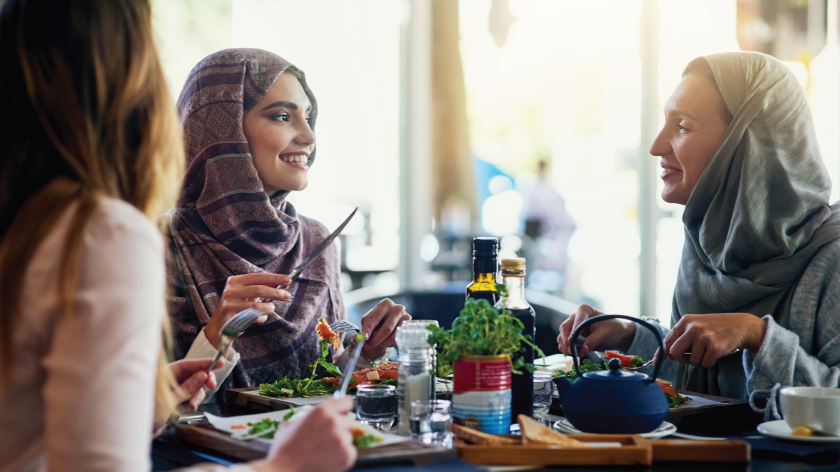 Muslim women having lunch to ditch the diet mentality - Vitality