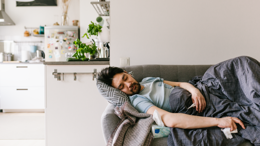 Man sick on couch at home - Vitality