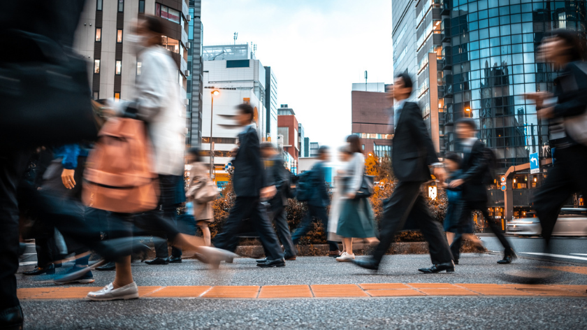 City sidewalk with professionals walking - Vitality